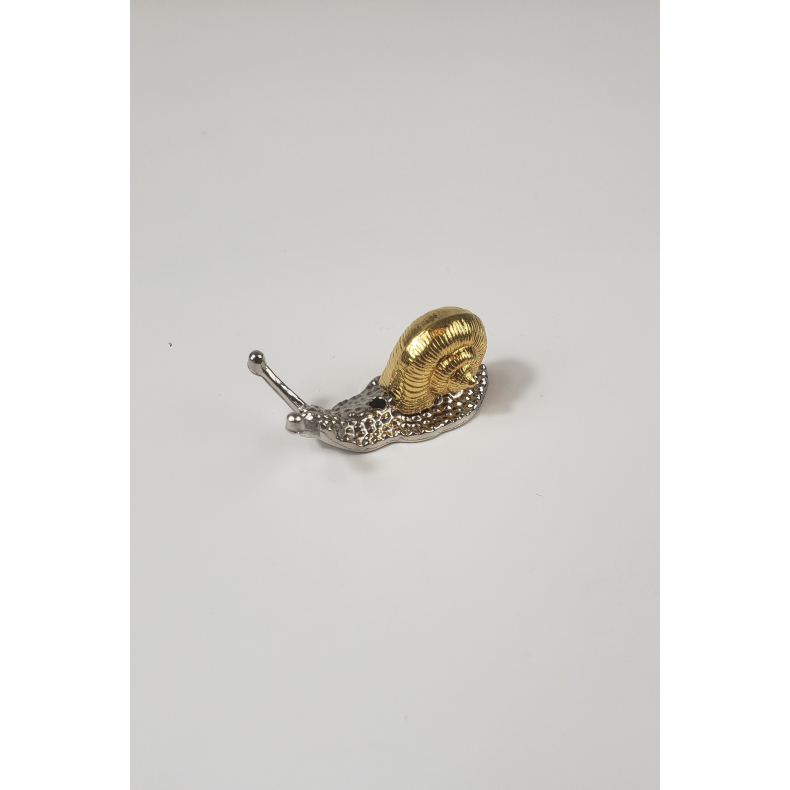 Rgelsesholder snegl, guld og slv farvet