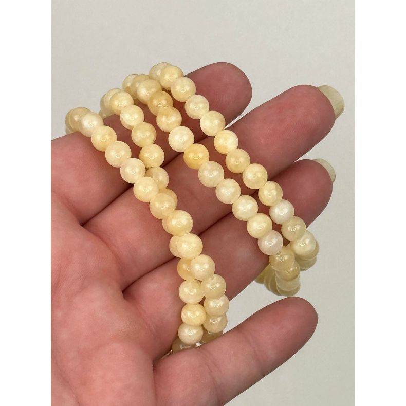 Orange Calcit armbnd, 6 mm perler