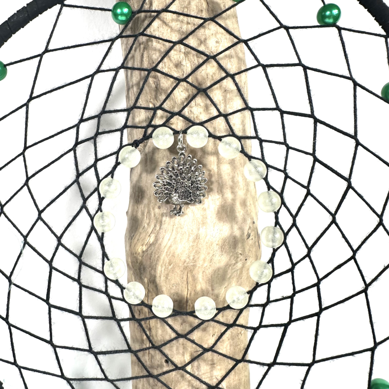 Drmmefanger m. pfugle og grnne fjer 