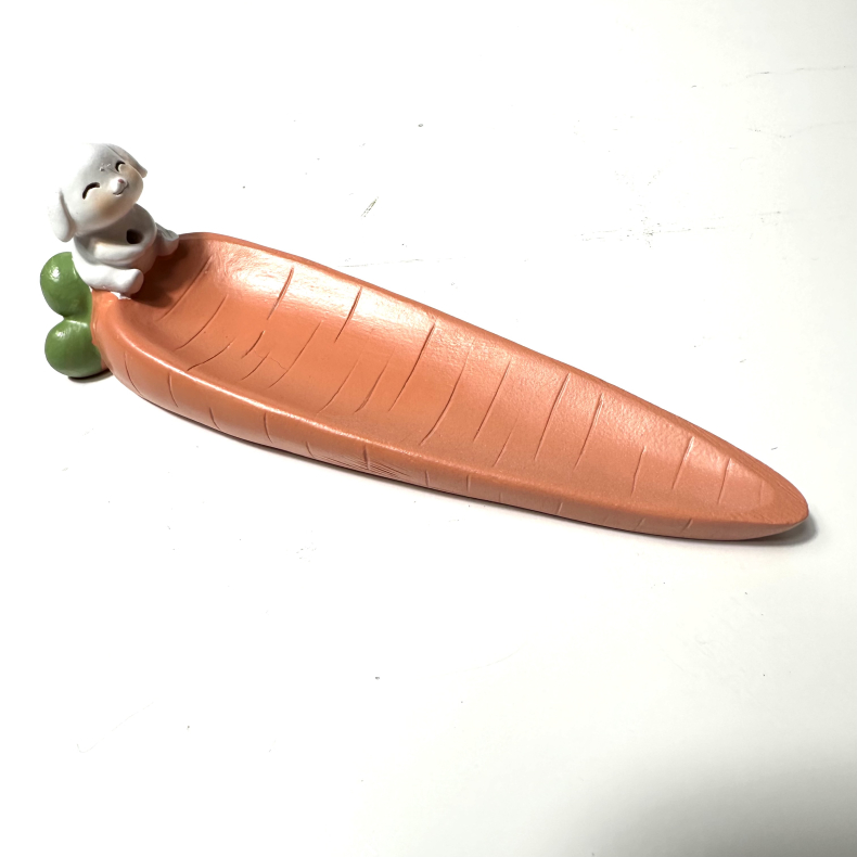 Rgelsesholder med kanin i gulerod