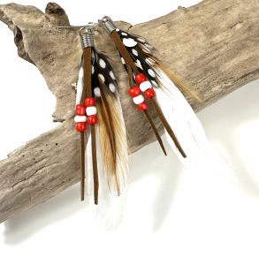 Hvid fjer, �reringe 