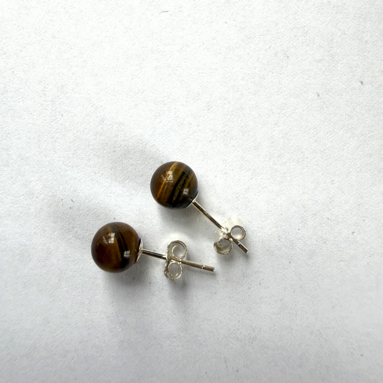 Tiger�je �restikker i s�lv 